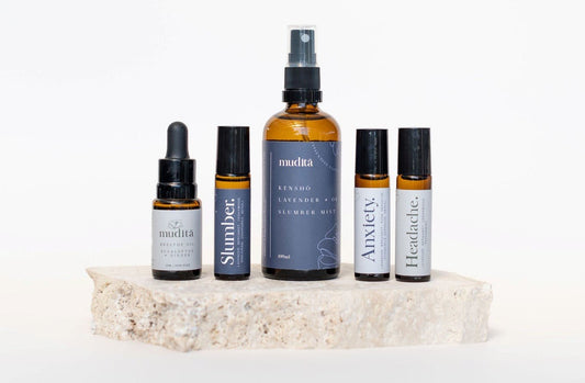 Aromatherapy Wellness self-care products, including slumber spray, roll-ons and essential oil